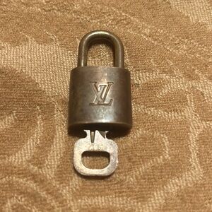 Louis Vuitton Brass Lock & Key Set / Length:2” Width:1” / In Good Condition